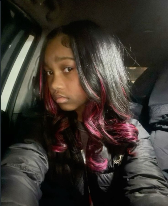 Client with a smooth quick weave by Tee