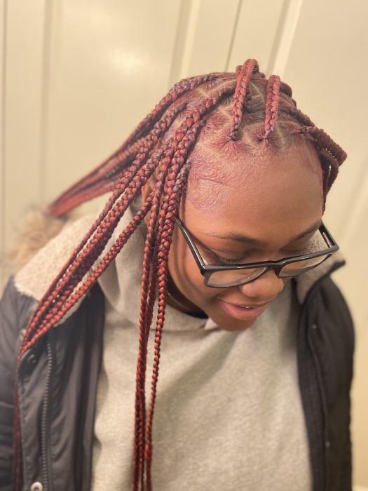 Small knotless braids styled by Tee